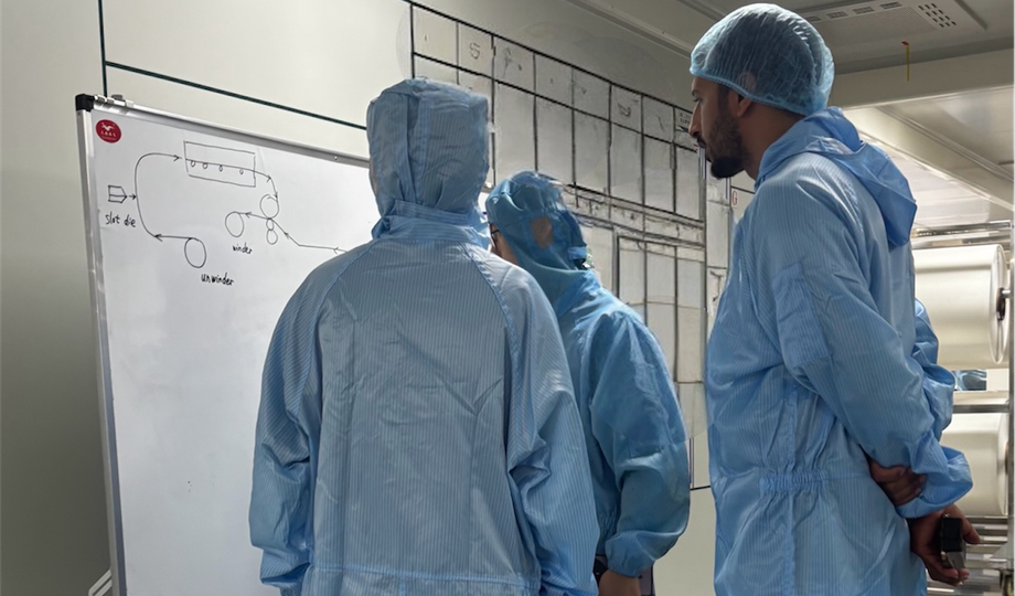 GenusCars Founder inspecting PPF manufacturing process at factory quality control